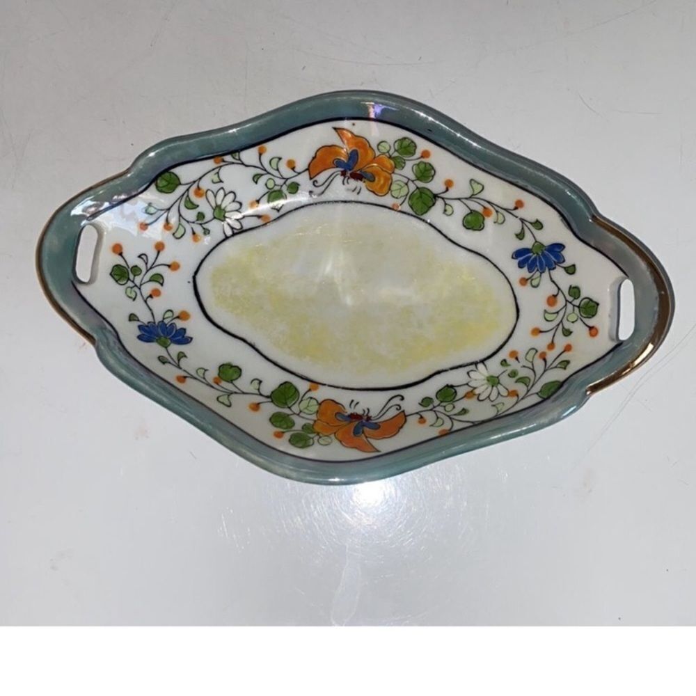 Hand-Painted Porcelain Dish with Red and Brown Design